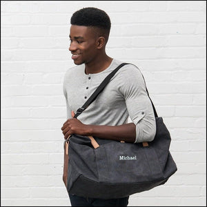 Black Canvas Duffel Bag with Person