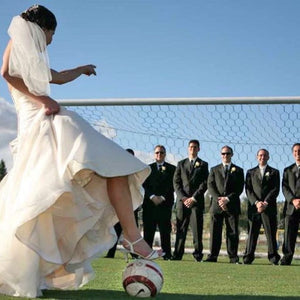 Bride Kicking Soccer Ball